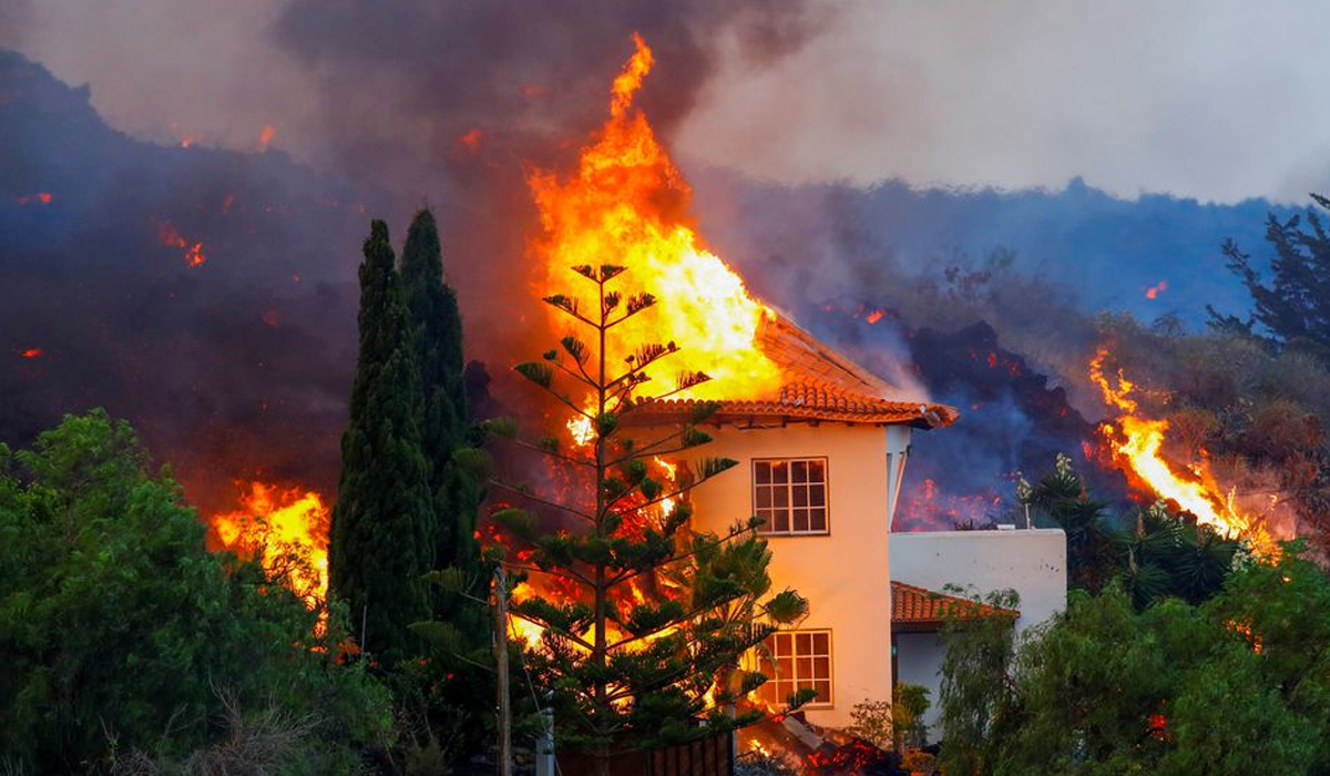 Thousands flee as lava spewing from volcano on Spain's La Palma island destroys houses